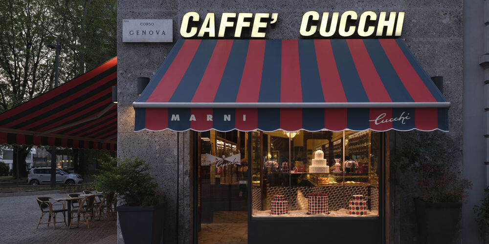 Exterior of Caff&egrave; Cucchi in Milan with red and green striped Marni awning