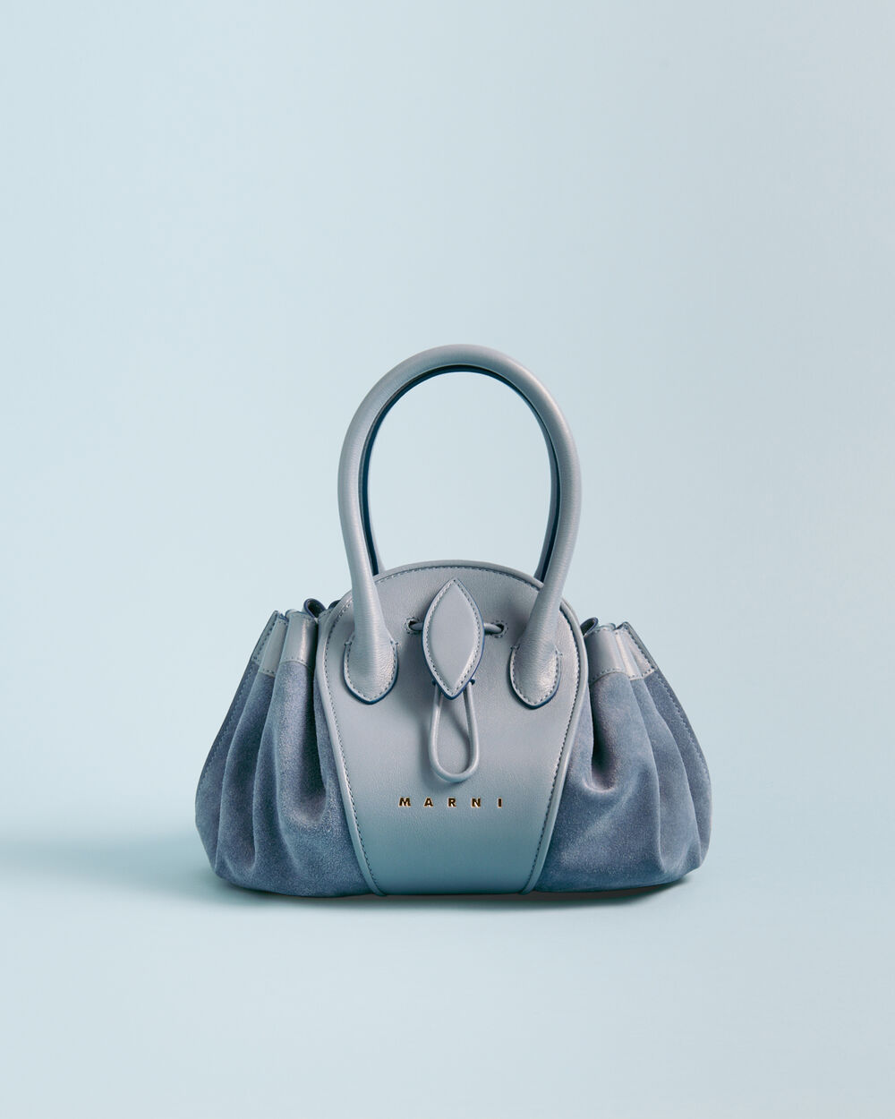 Light blue Marni Tulipea bag shown against a matching background