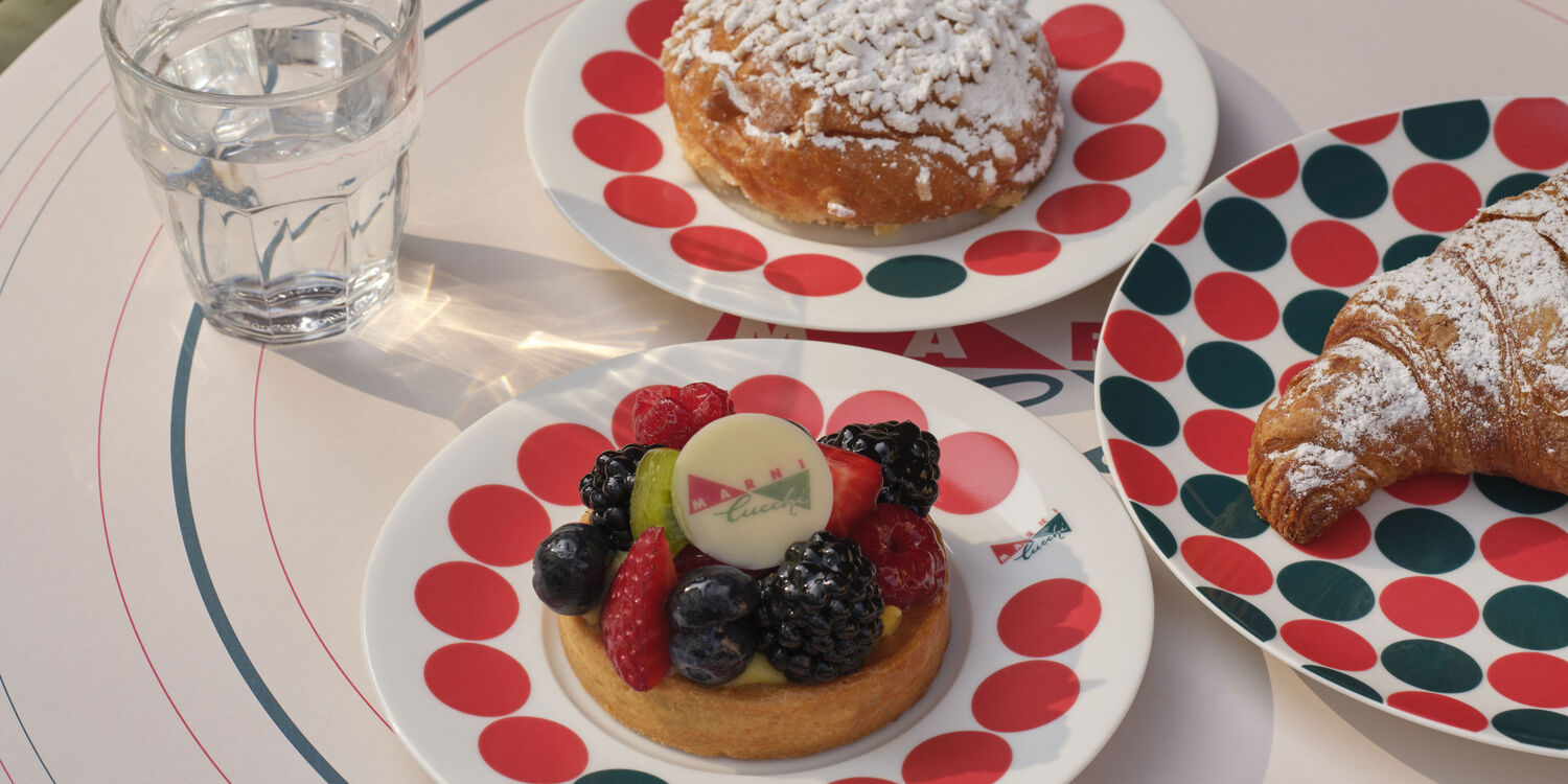 Table setting with Marni Cucchi plates holding pastries