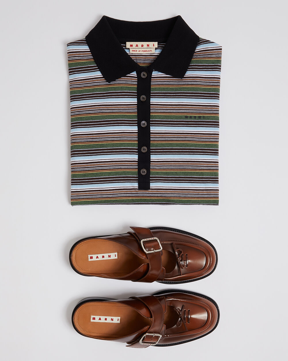 Women&rsquo;s Marni striped knit top with black collar, paired with brown leather loafers