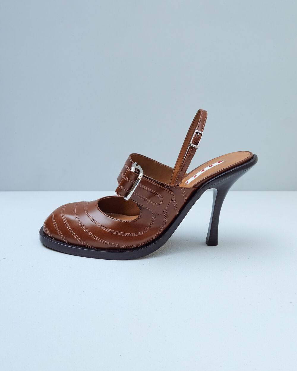 Brown Marni slingback pump with stitching and a buckle detail
