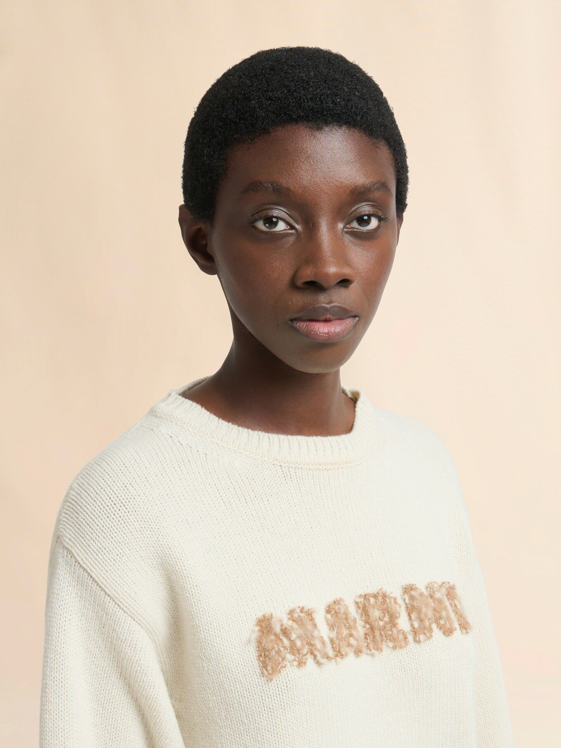 Cream wool sweater with laser-cut Marni logo | Marni