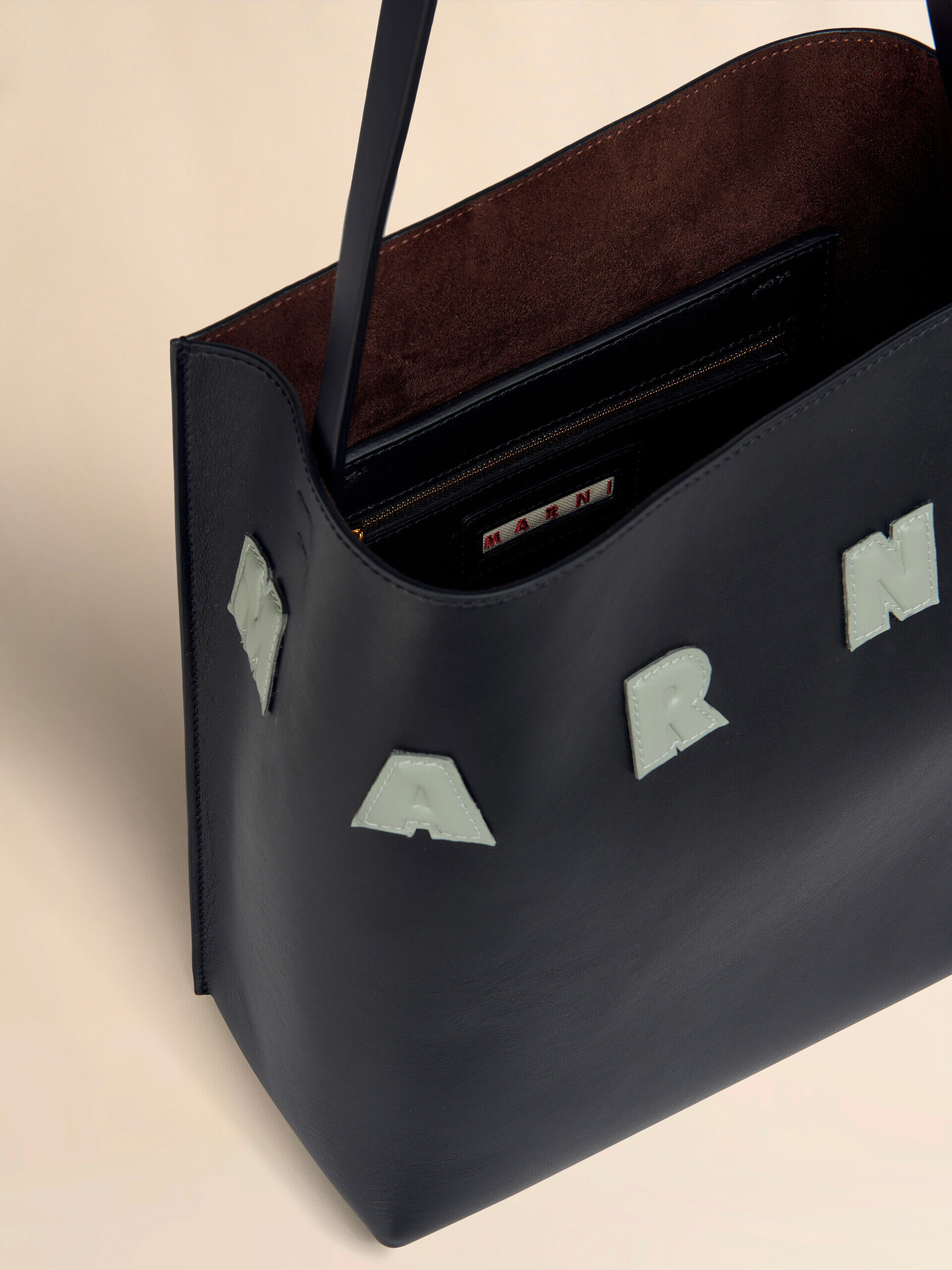 Small black leather Museo hobo bag with patches | Marni