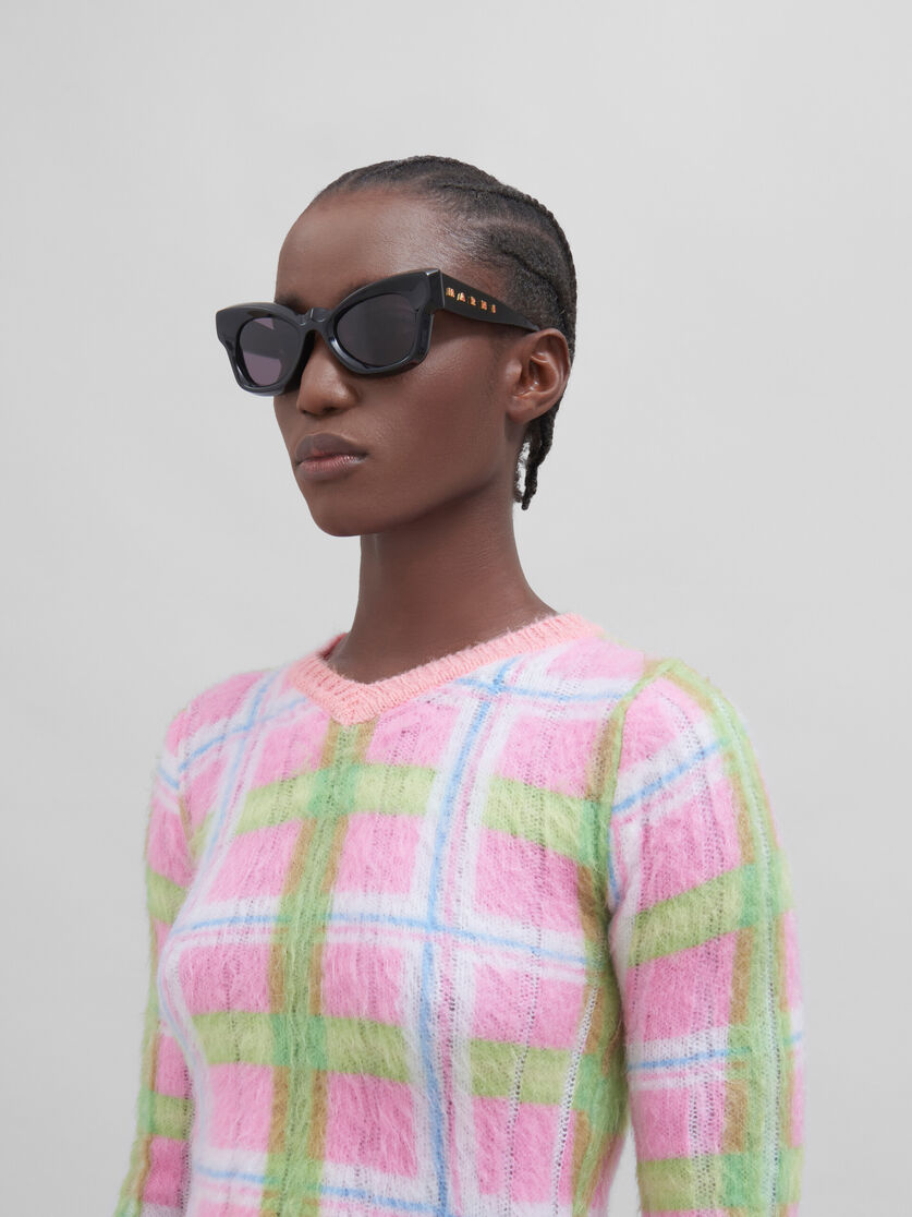 Sonnenbrille Magneticus in Schwarz | Marni