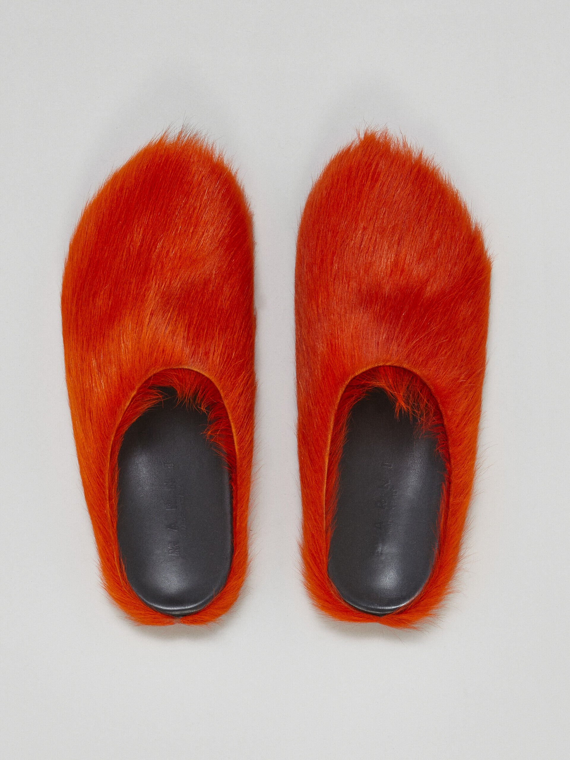 Marni Calf Hair And Leather Slippers in Black | Lyst