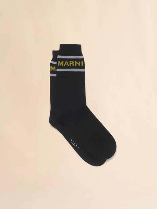 Calcetines negros con logotipo en el dobladillo - Calcetines