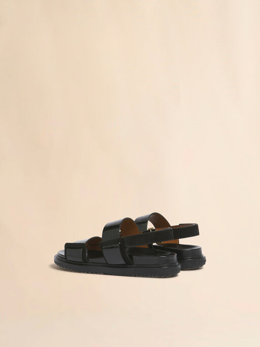 Fussbett aus schwarzem Leder mit doppeltem Riemen - Sandalen