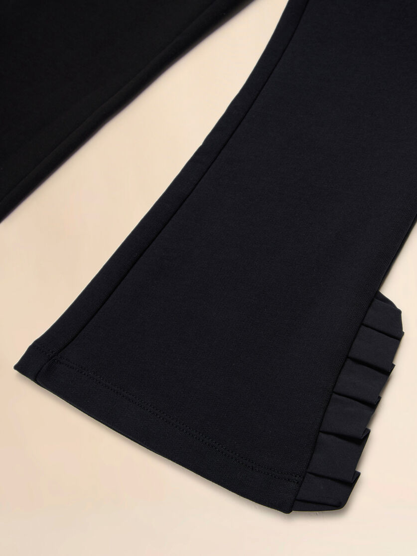 Pantaloni in felpa di cotone nero con volant, Image 4