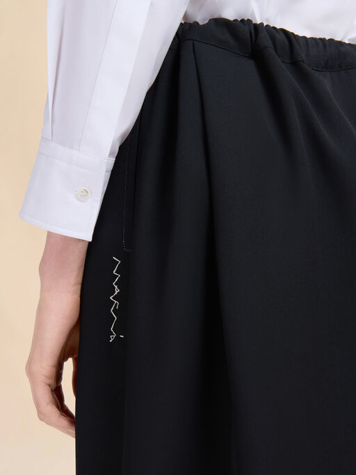 Black Batavia wool low-crotch trousers - Pants