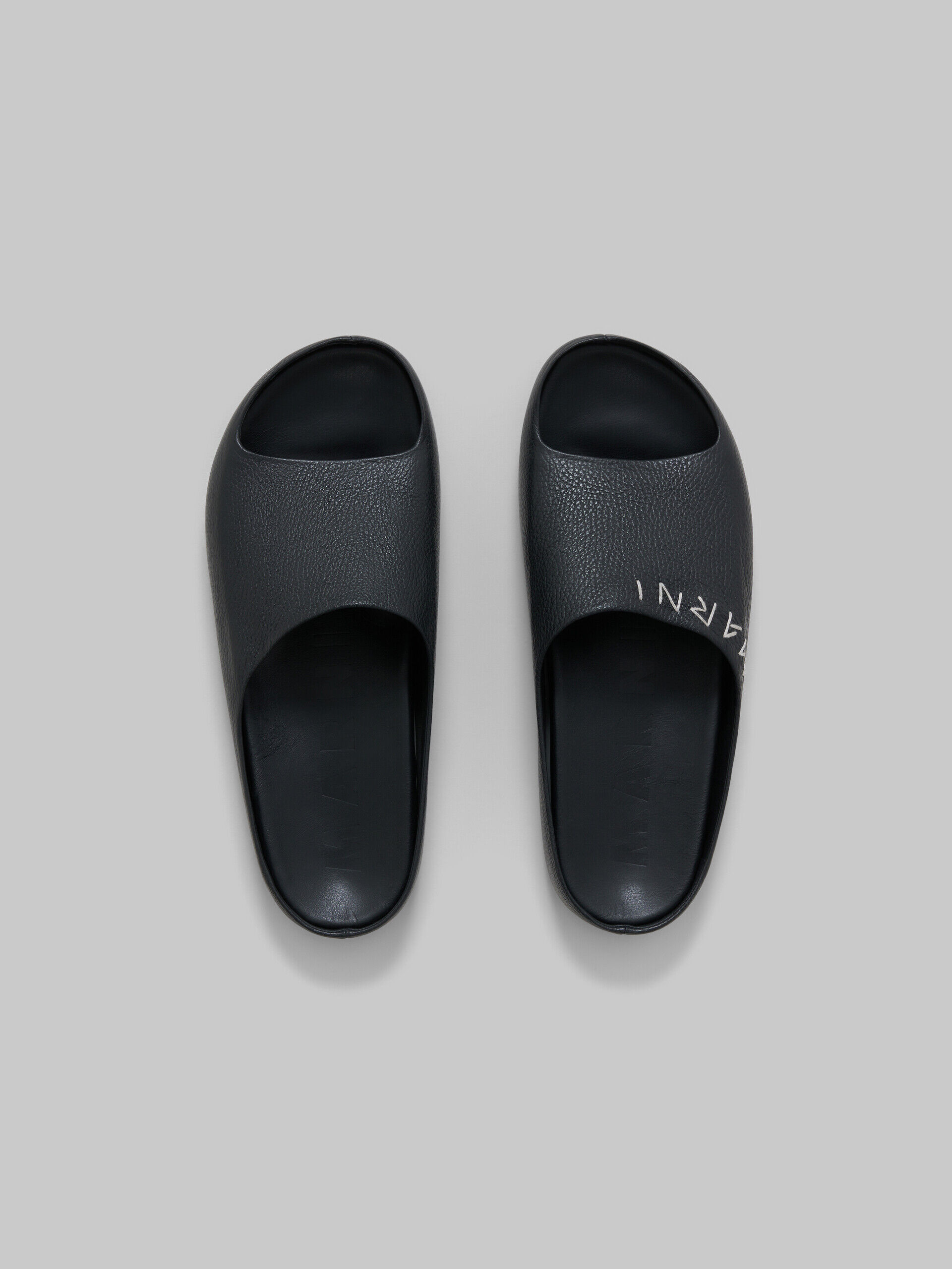 Black leather Fusslide sandal with Marni Mending embroidery