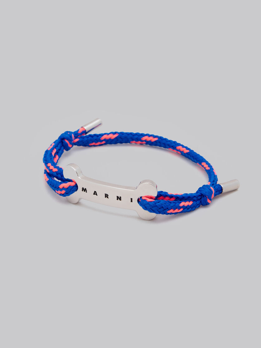 Bracelet en lacet bleu avec plaque en forme d’os - Bracelets - Image 4