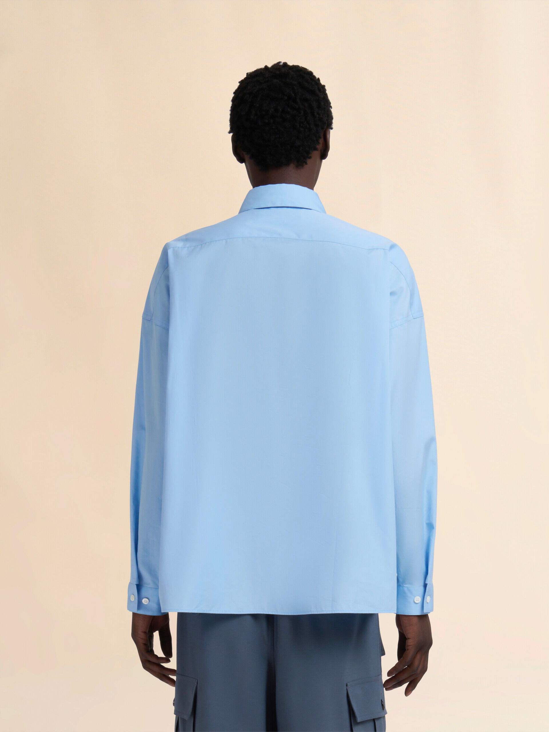 Light blue organic poplin shirt with peeping Marni logo | Marni
