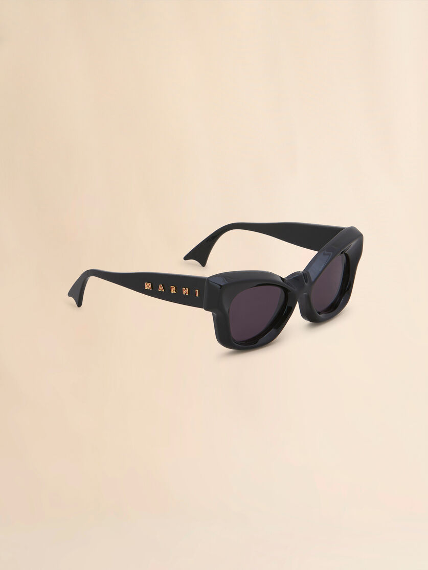 Sonnenbrille Magneticus in Schwarz | Marni