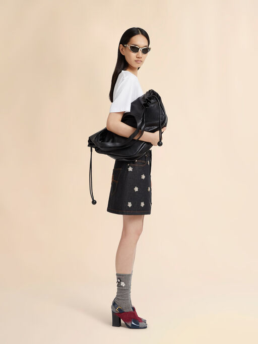 Black denim skirt with daisy appliqués - Skirts