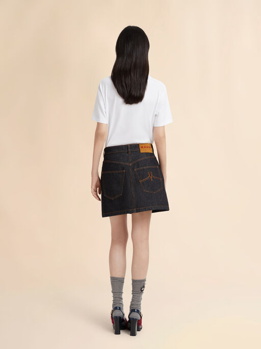Black denim skirt with daisy appliqués - Skirts
