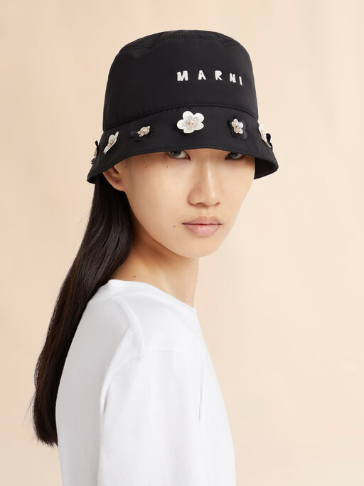 Black taffeta bucket hat with daisy appliqués - Hats