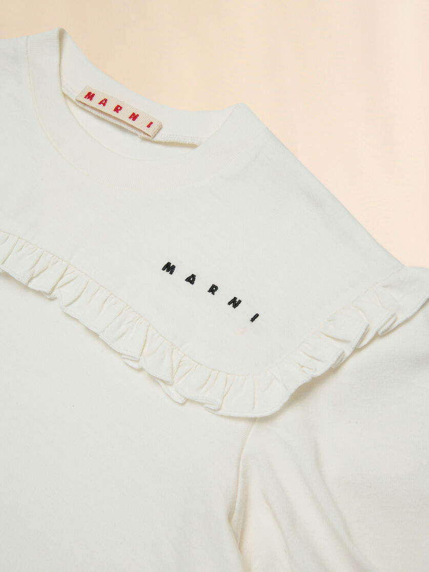 Cremefarbenes Baumwoll-T-Shirt mit Rüschenbesatz - T-shirts - Image 4