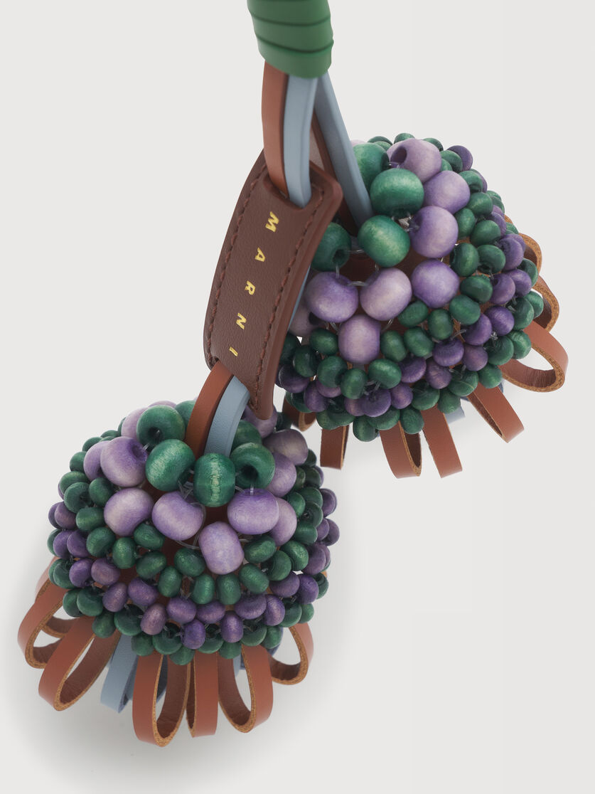 Brown and blue leather keyring with wooden bead detail, Image 2