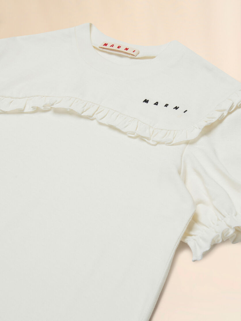Cremefarbenes Baumwoll-T-Shirt mit Rüschenbesatz - T-shirts - Image 3