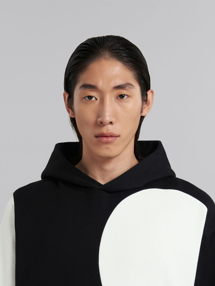 Black bio cotton hoodie with maxi polka dots - Sweaters - Image 4