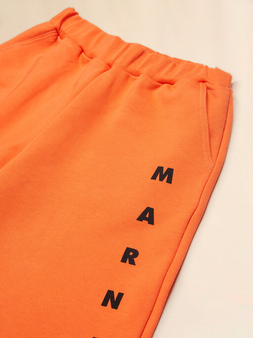 Orange cotton sweat shorts with Marni print - Pants