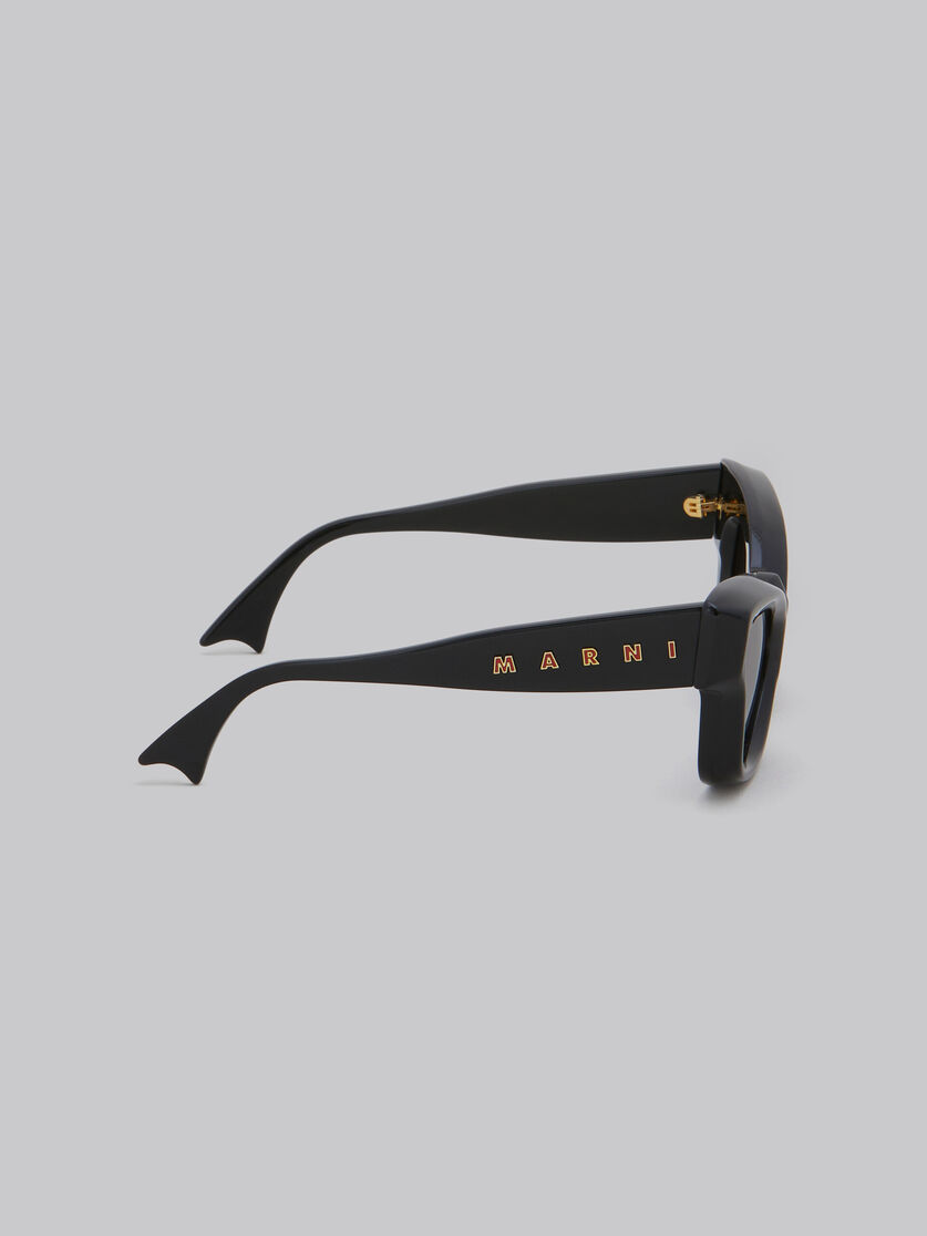 Sonnenbrille Magneticus in Schwarz | Marni