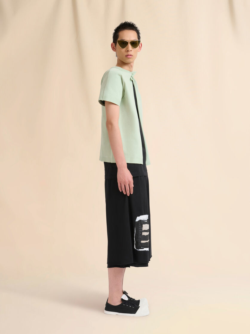 T-shirt in cotone verde con schiena scoperta e tasca Trunkaroo - Camicie - Image 5