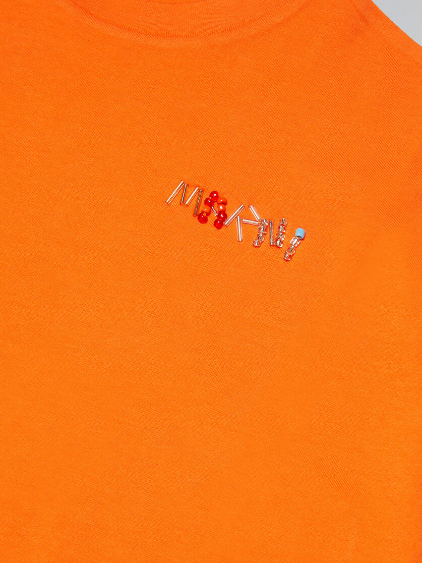 Orangefarbenes T-Shirt im Cropped-Stil mit Logo - T-shirts - Image 4