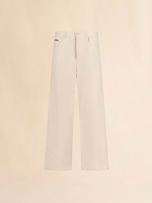 Vaquero de pernera ancha con placa Trunkaroo en crema - Pantalones