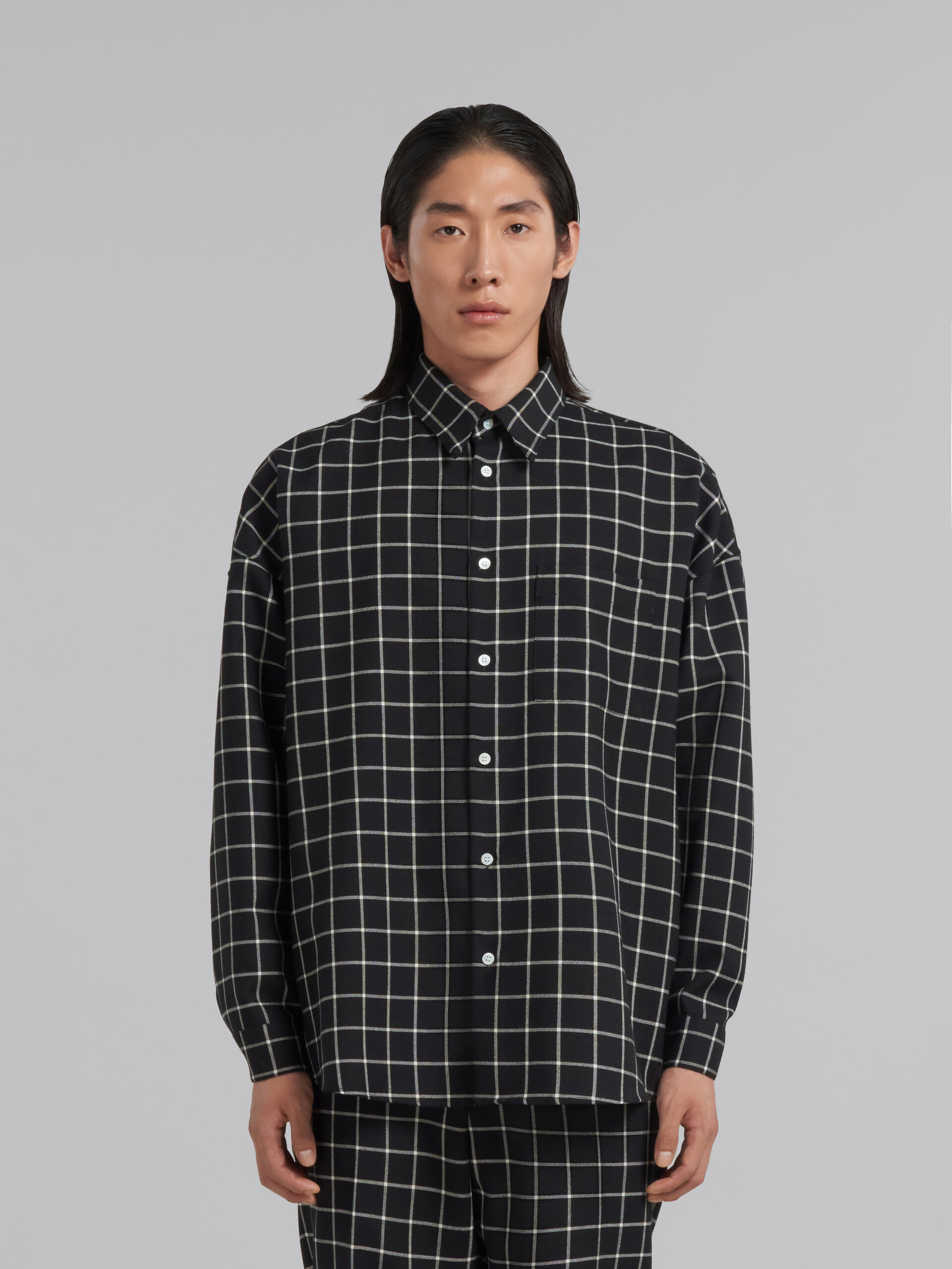 Black wool long-sleeved shirt with checked pattern