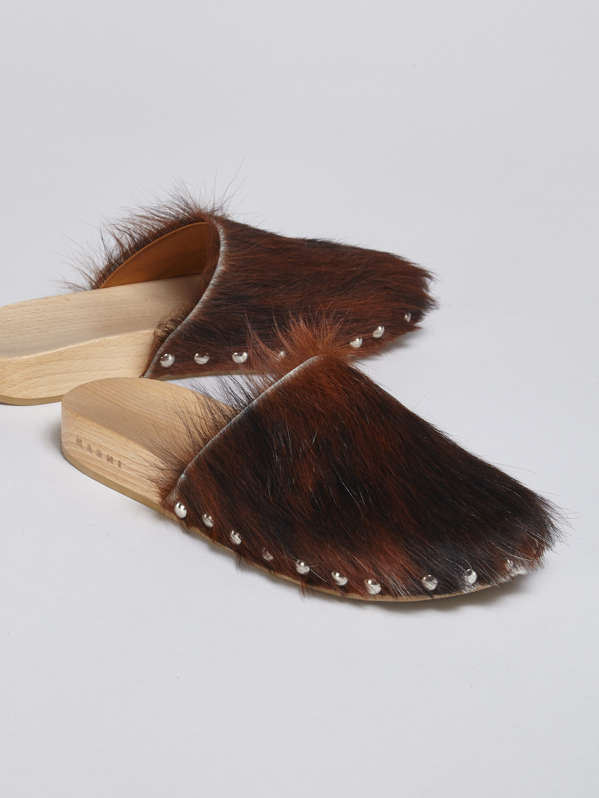 Spotted long calf hair wood sabot - Clogs - Image 5
