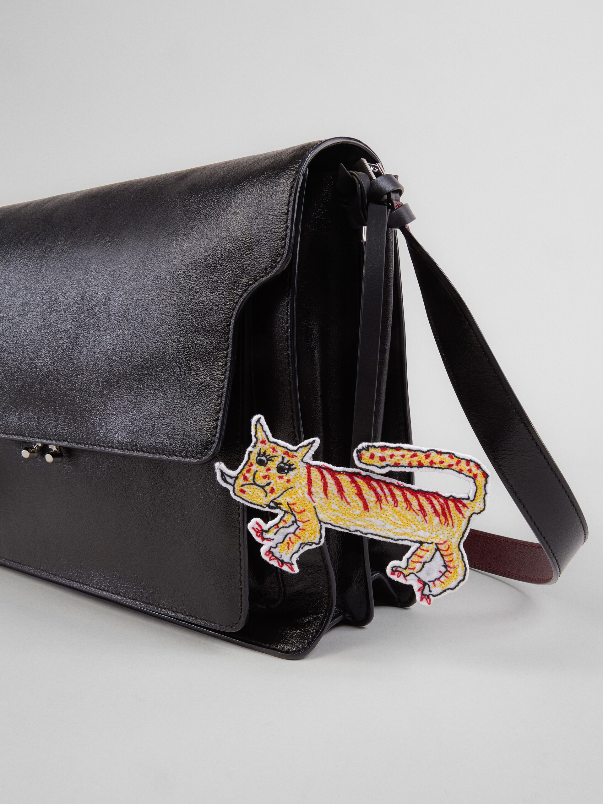 TRUNK SOFT bag in black leather and naif tiger print - Shoulder Bag - Image 4
