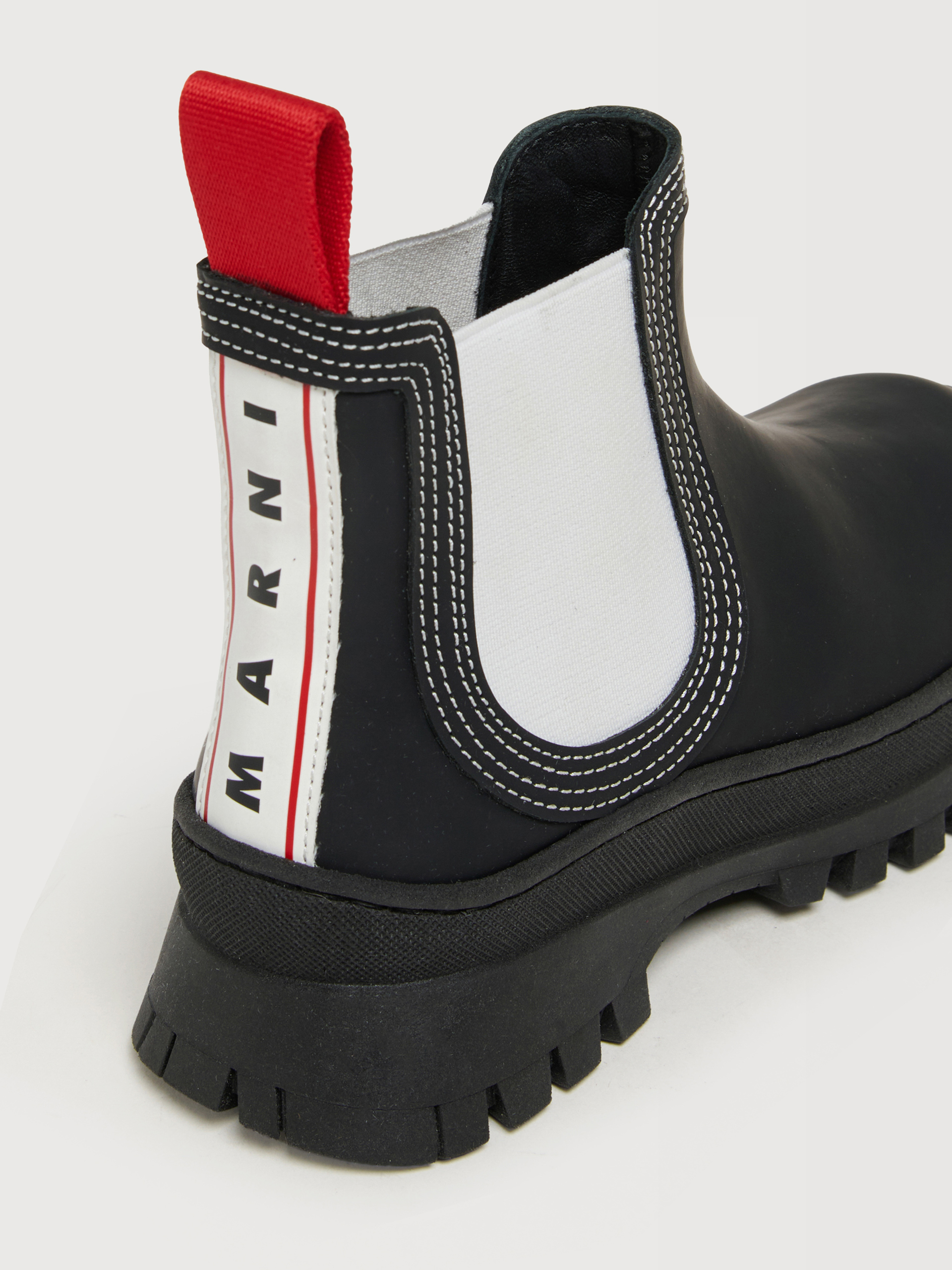 Black ankle boots with track sole - Sneakers - Image 4