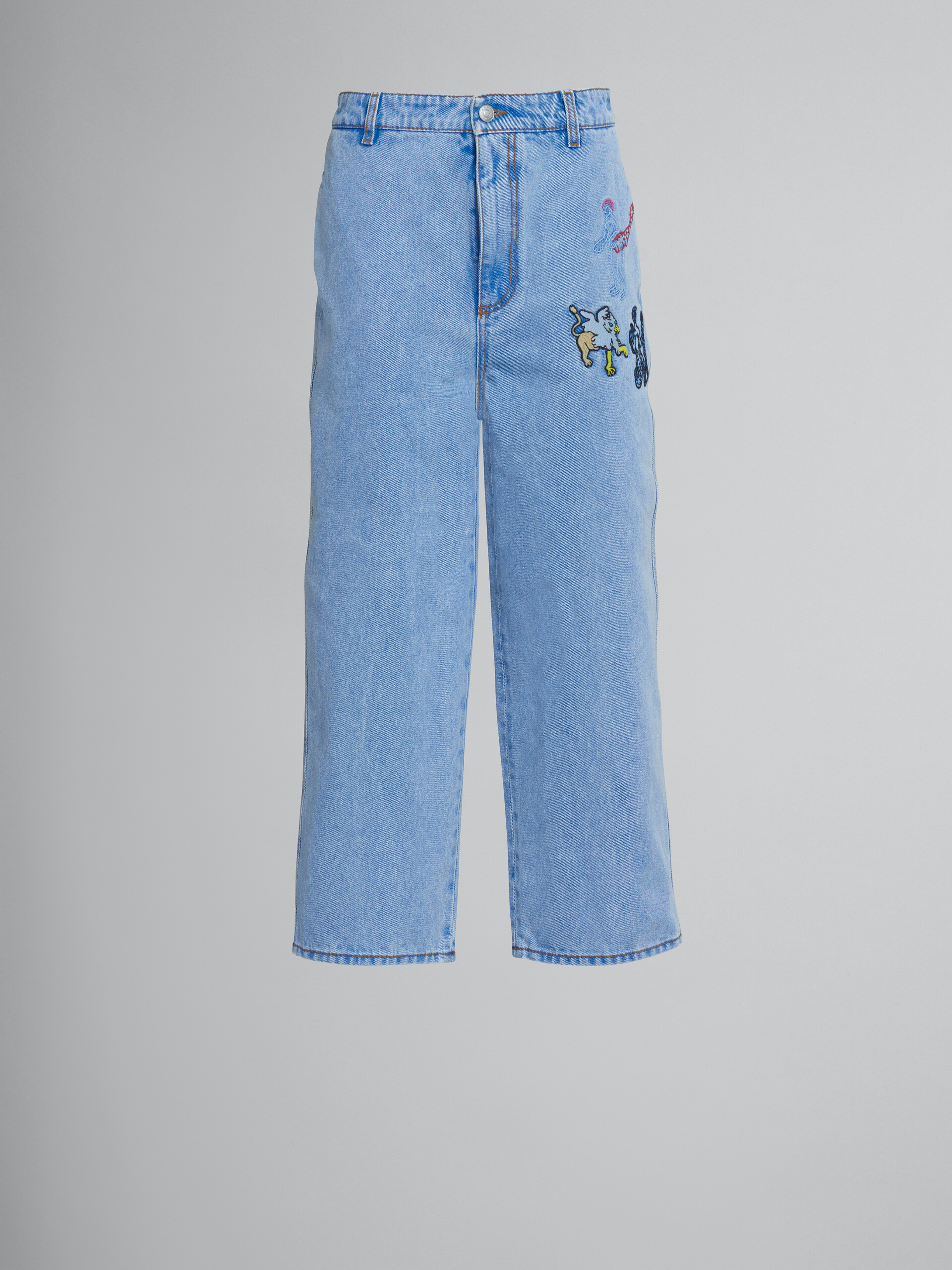 Loose trousers in light blue denim with embroidery - Pants - Image 1