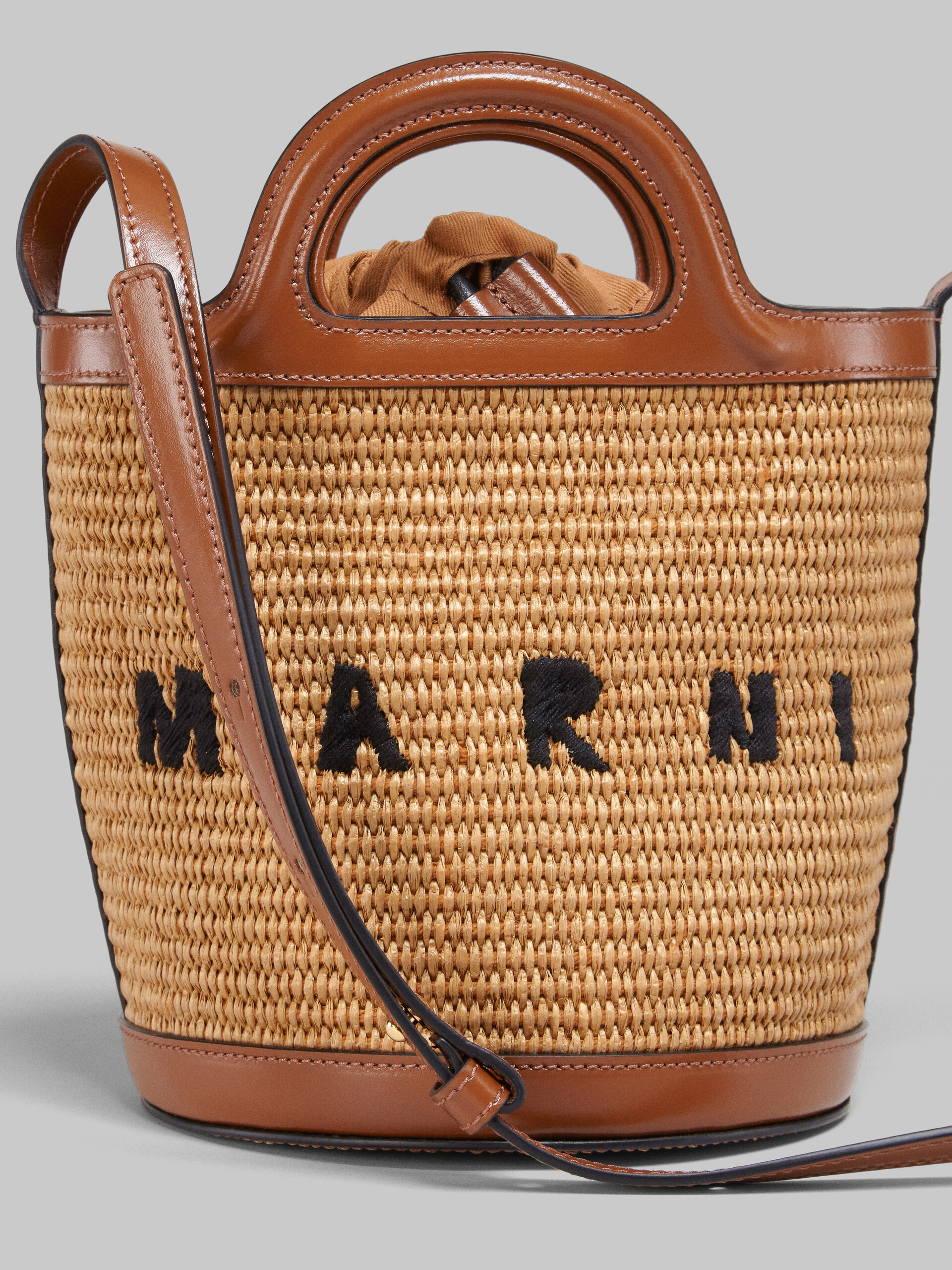 TROPICALIA mini bucket bag in brown leather and raffia