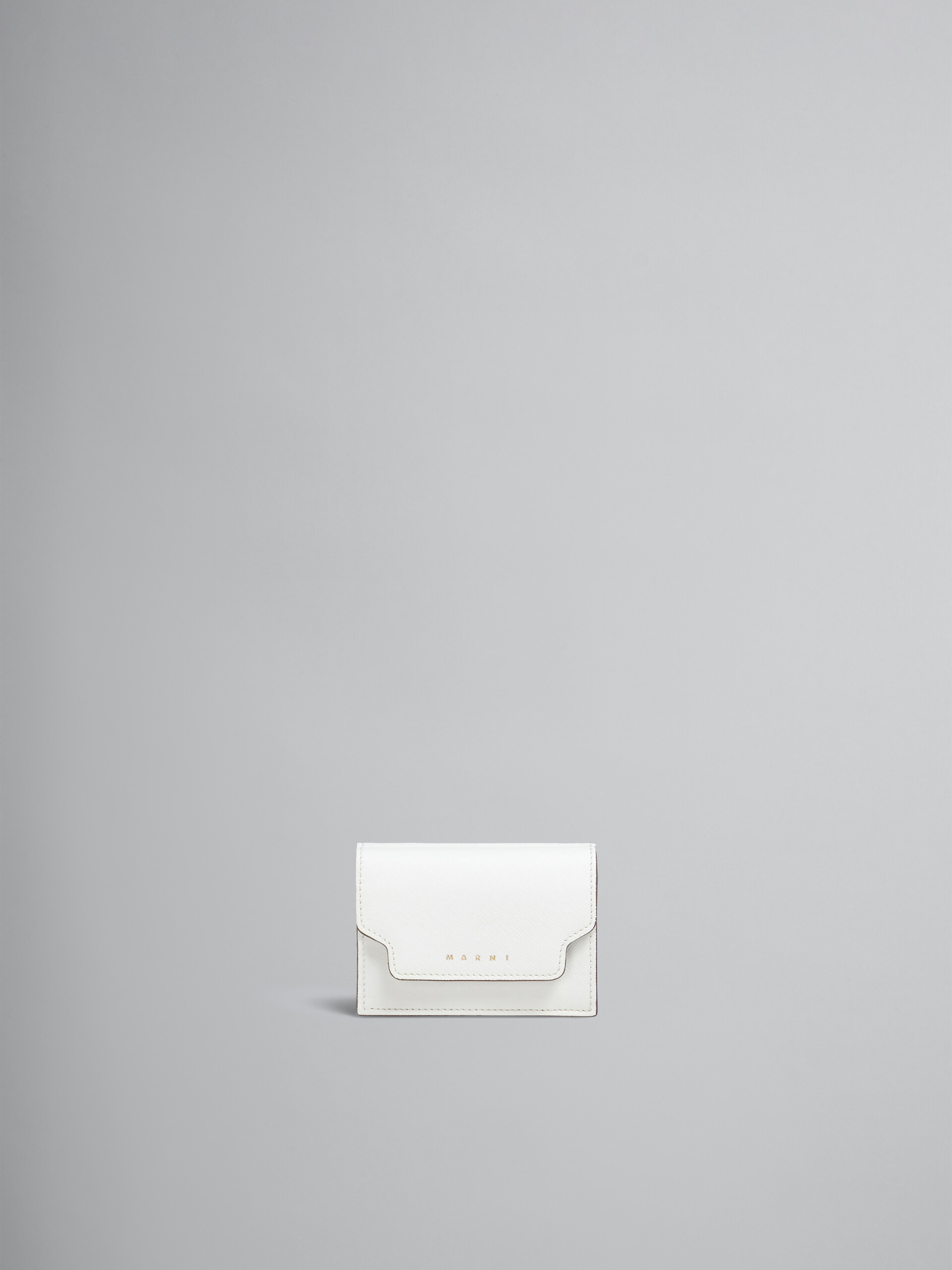 Tri-fold wallet in mono-coloured saffiano leather - Wallets - Image 1