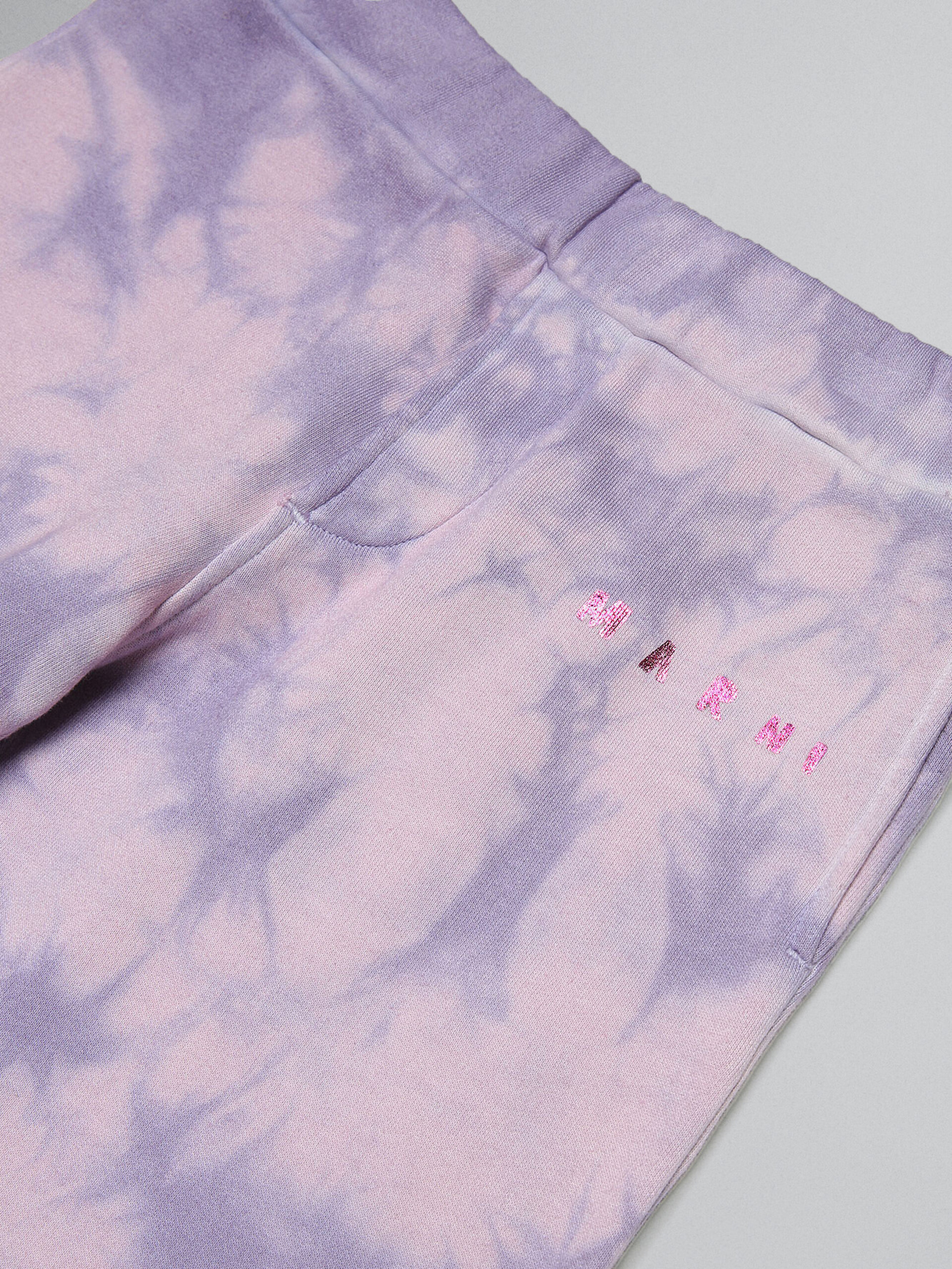 Lavender tie-dye track pants with metallic logo prints - Pants - Image 3
