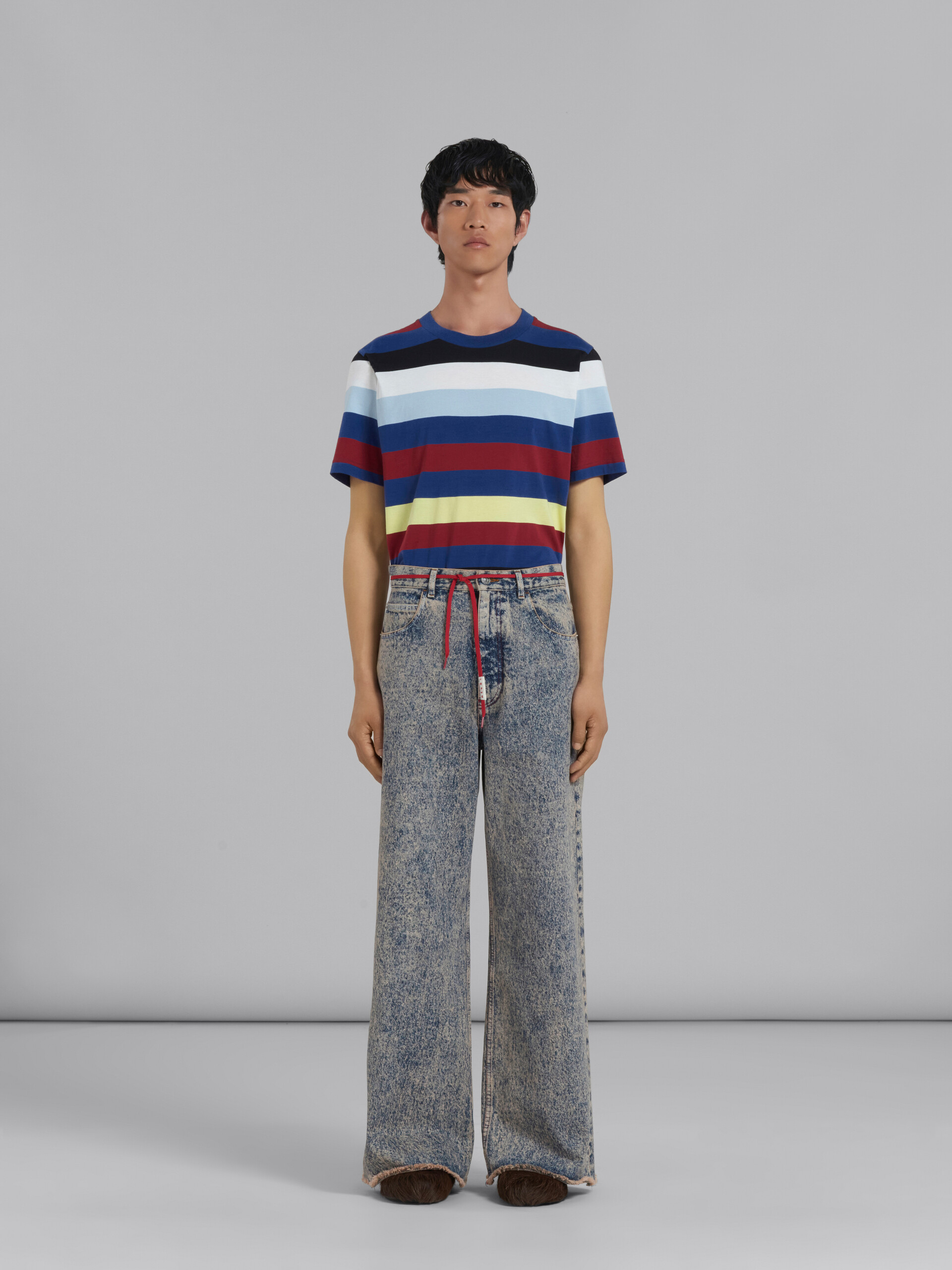 Pink flared 5 pocket trousers in marble-dyed denim