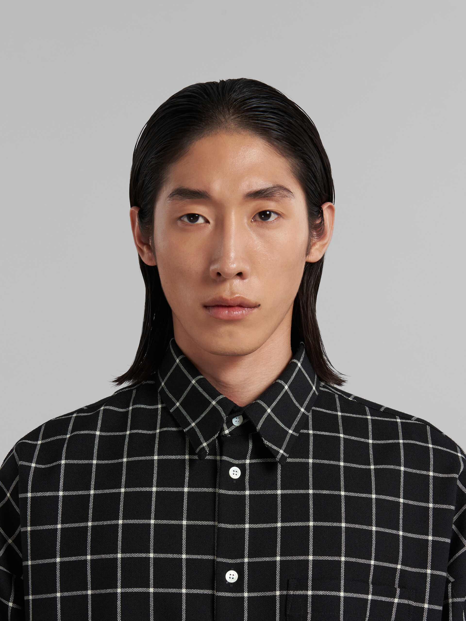 Black wool long-sleeved shirt with checked pattern