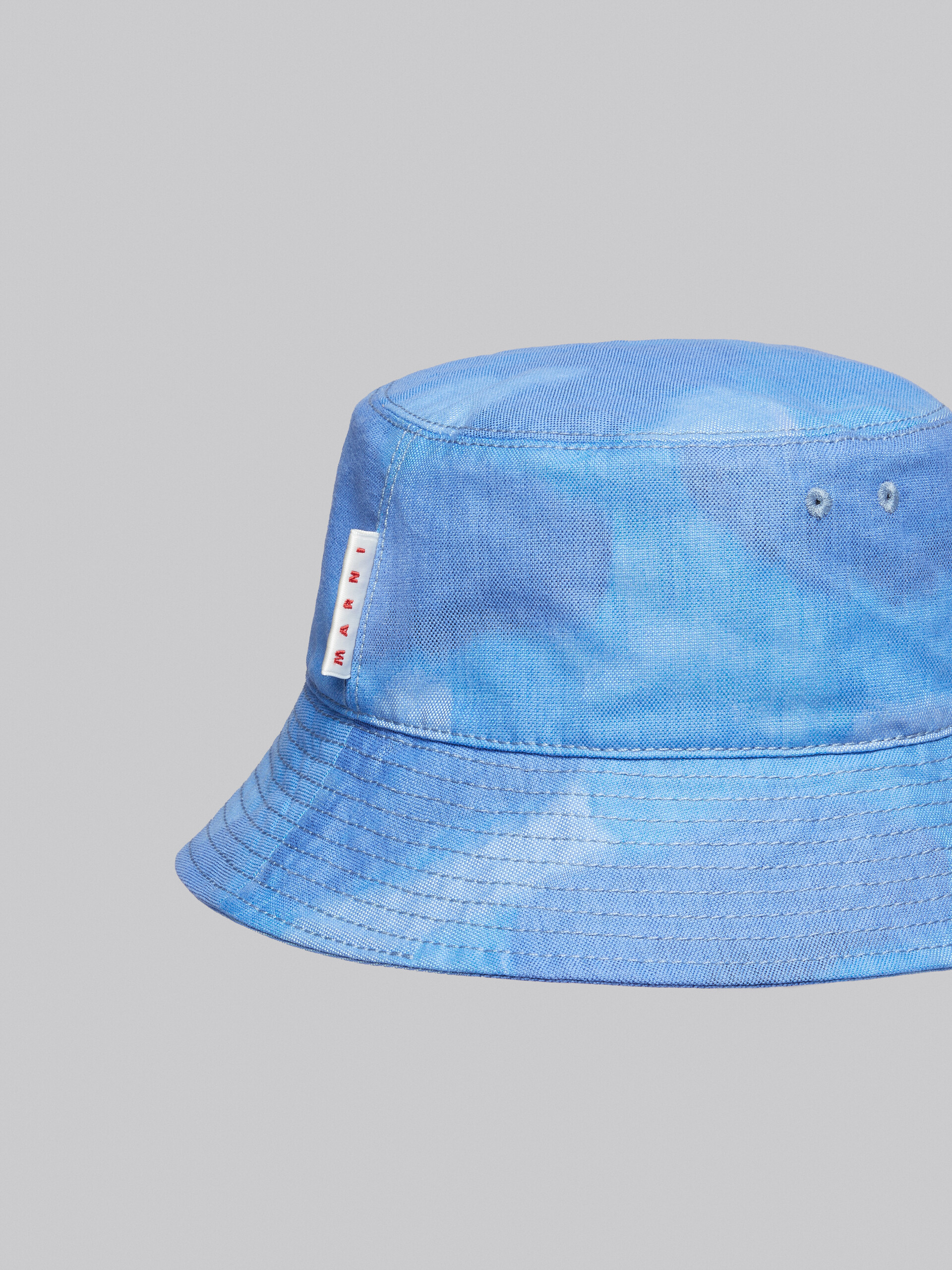 Bucket hat in canvas with light blue Clouds motif - Hats - Image 4