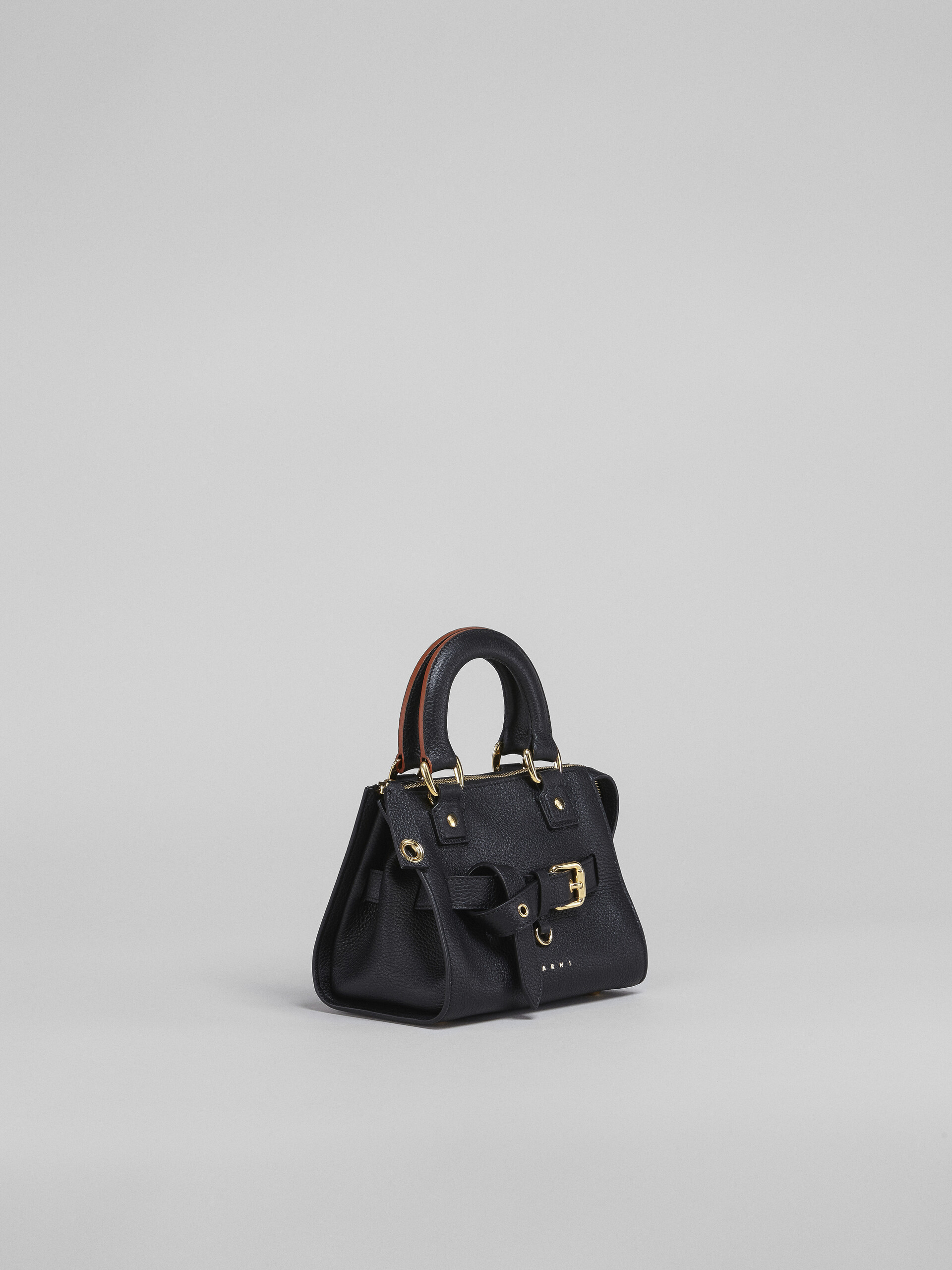 black top handle handbag