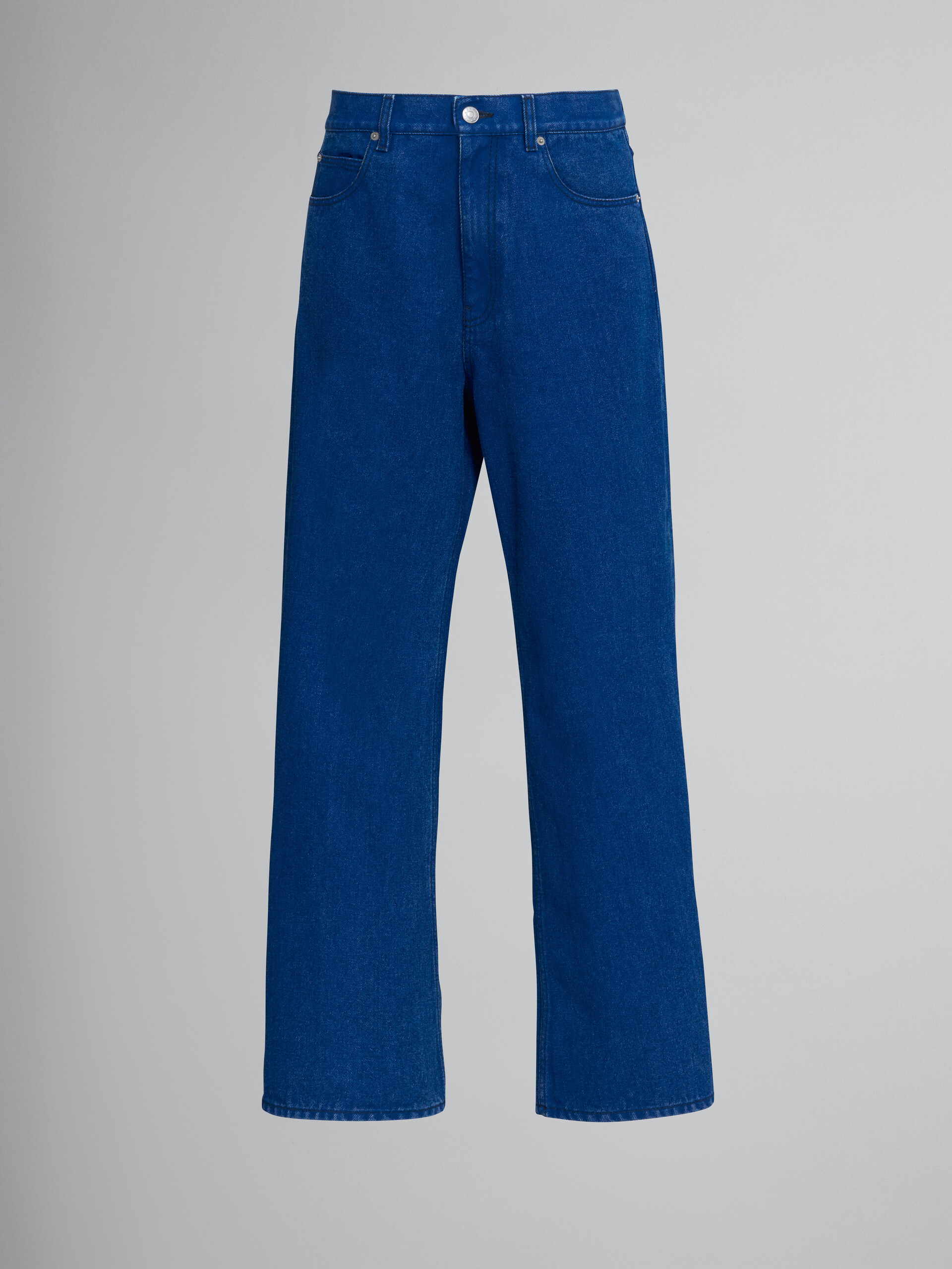 Flared trousers in coated blue denim - Pants - Image 1