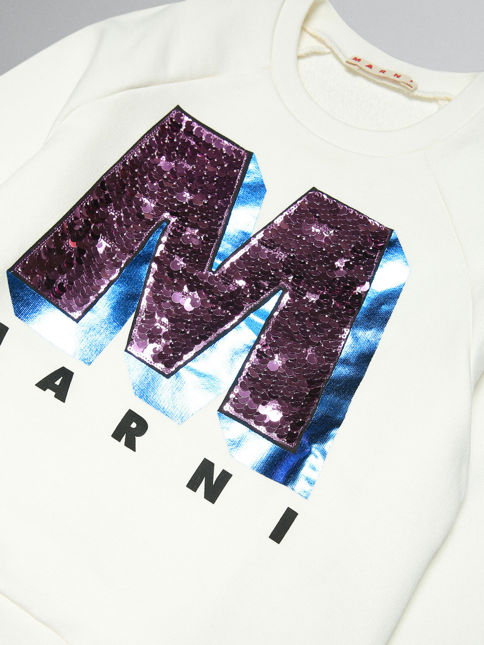 White sweatshirt with sequin "M" patch - Sweaters - Image 3