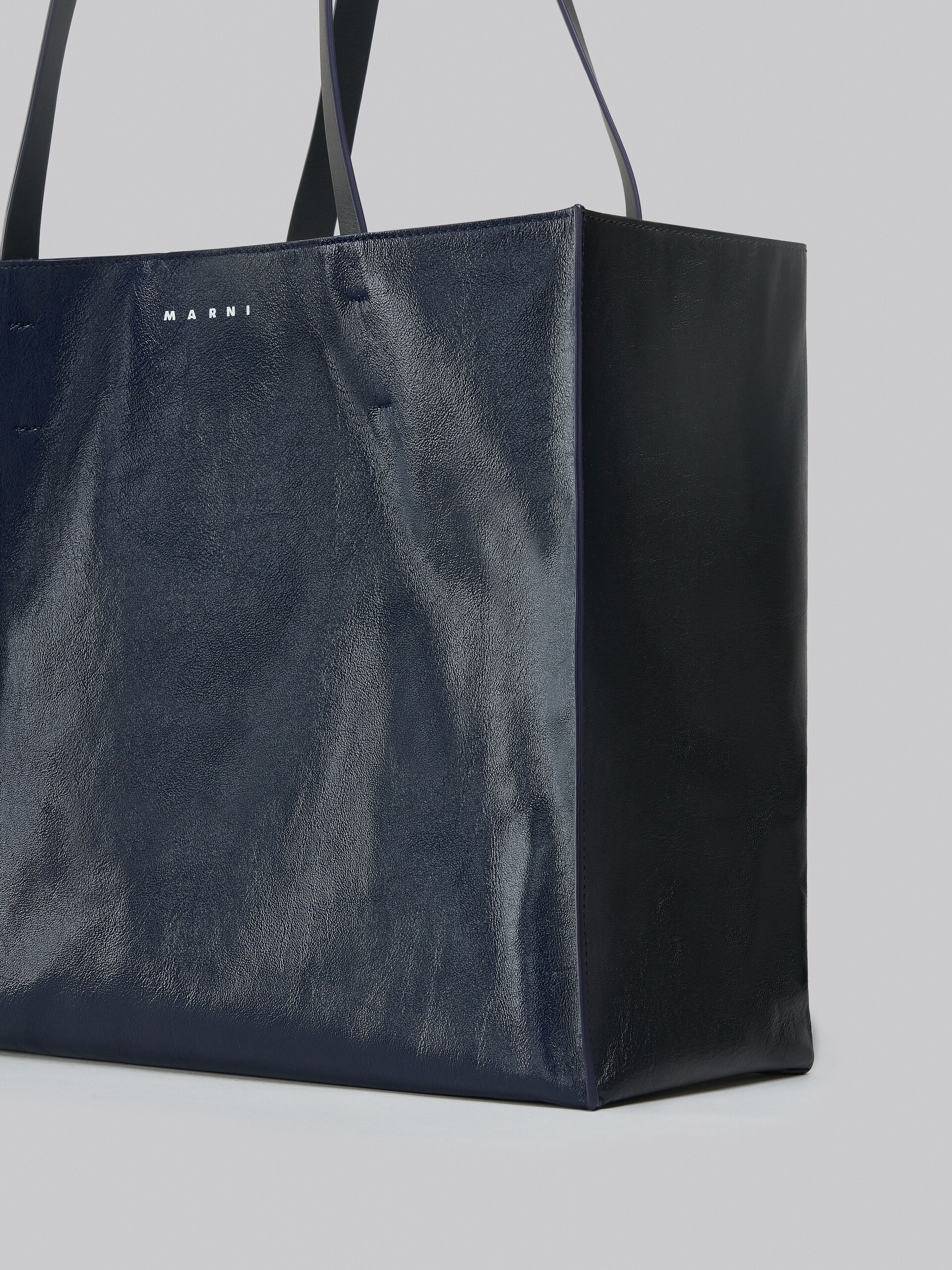 TRUNK SOFT large bag in blue and black leather