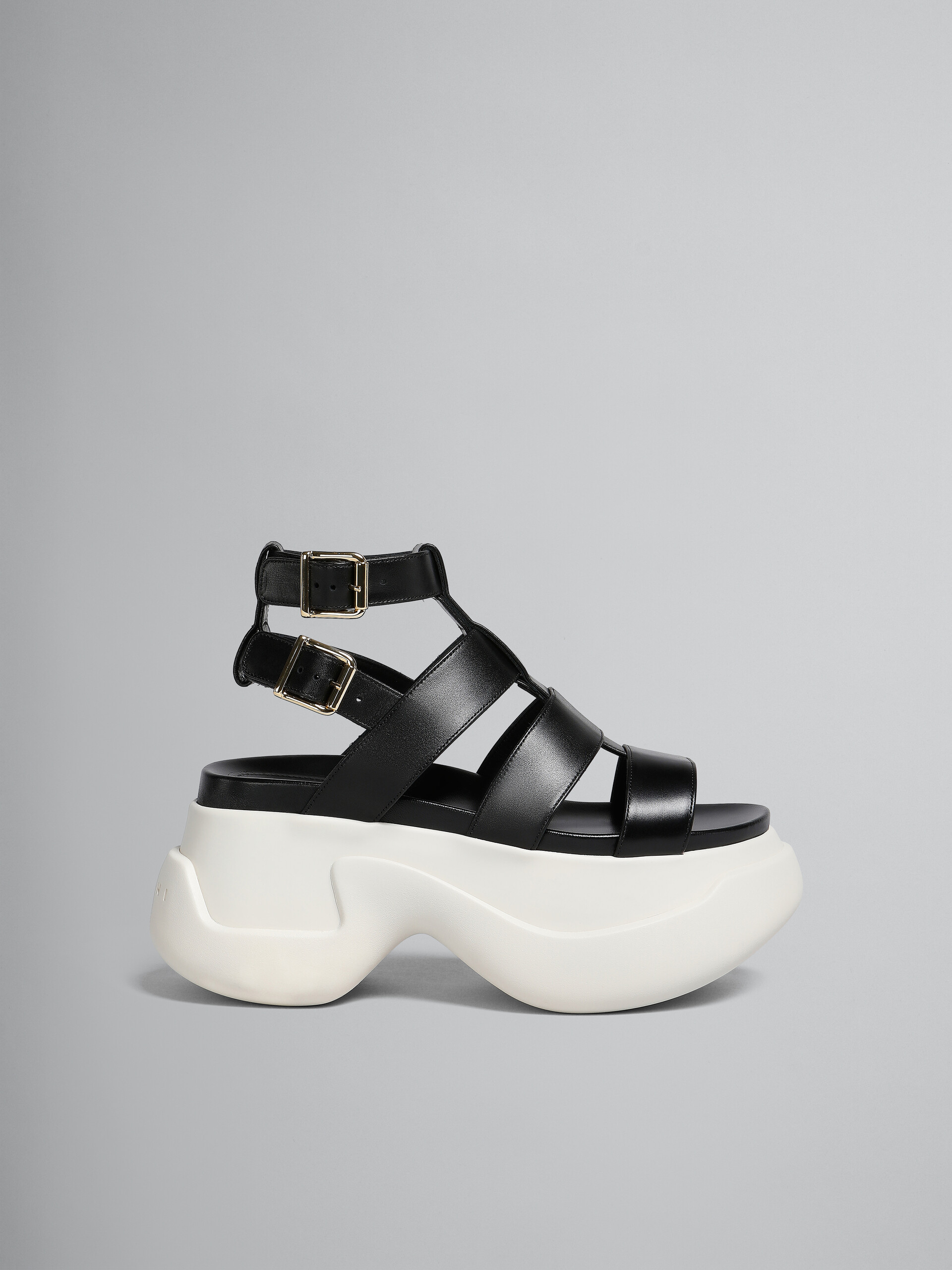 Black leather gladiator sandal with platform sole - Sandals - Image 1