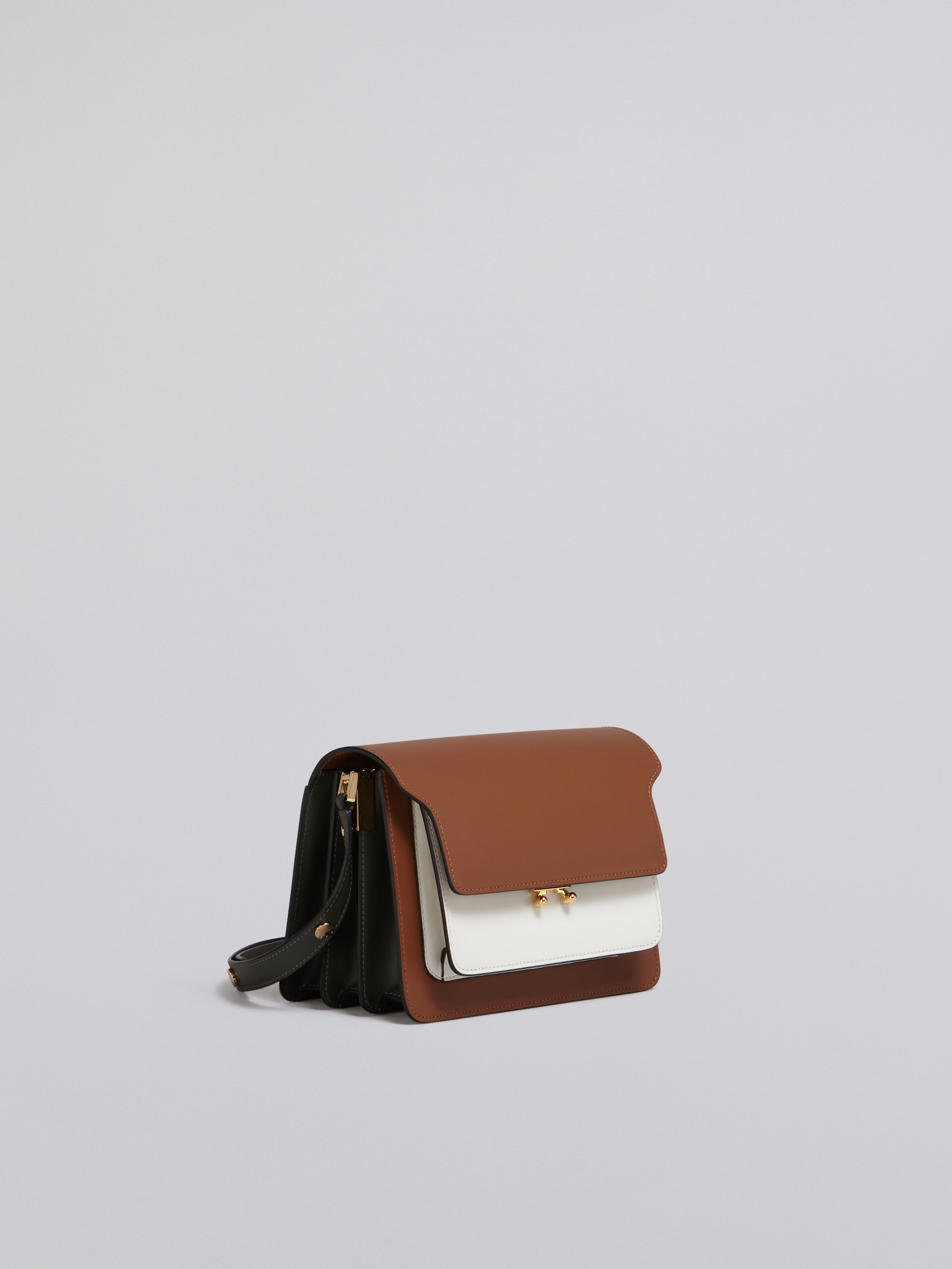 TRUNK media bag in brown white and green leather