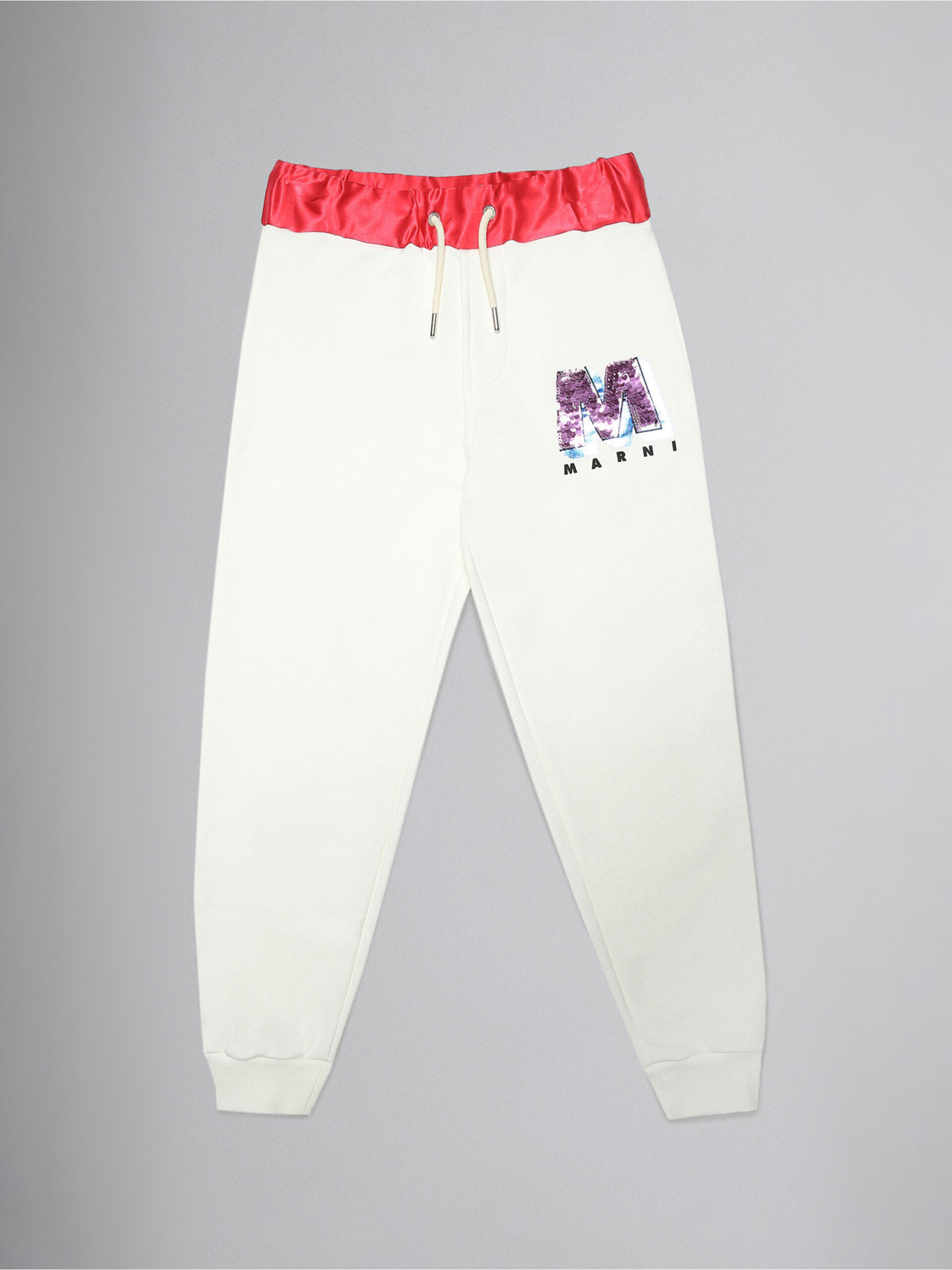 White French terry track pants with sequin "M" patch - Pants - Image 1