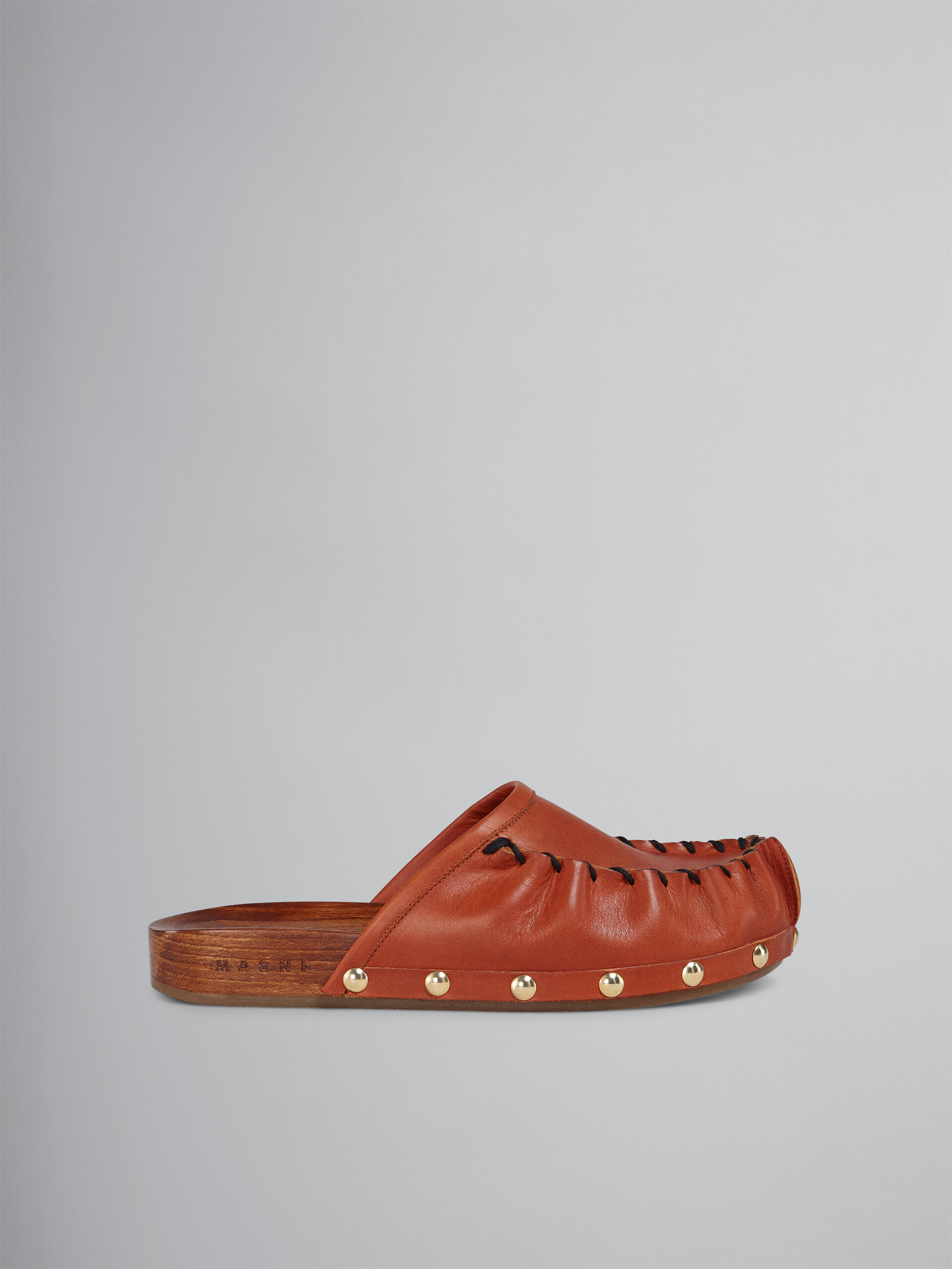 Vegetable-tanned leather and wood clog - Clogs - Image 1