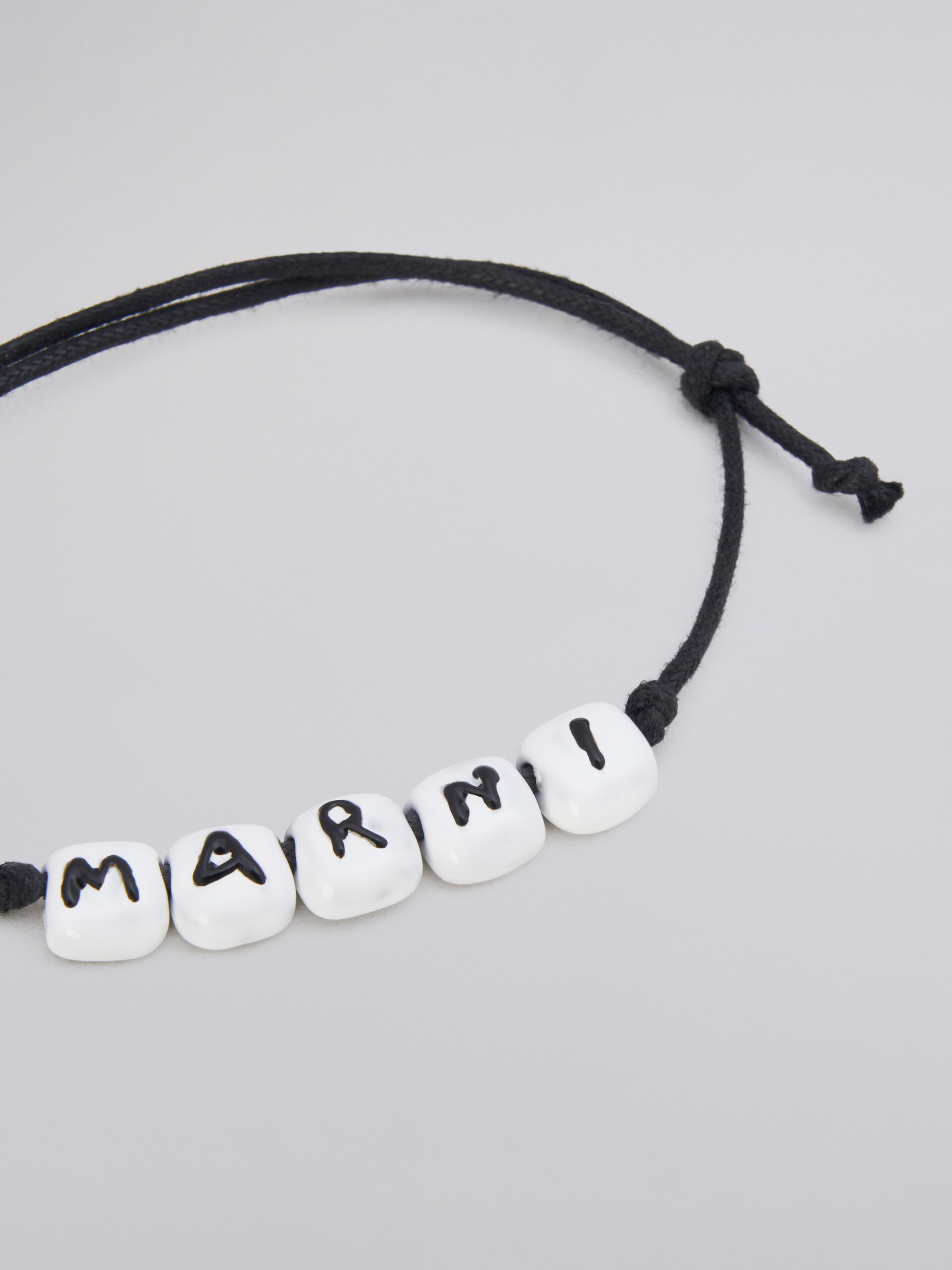 White logo bracelet - Bracelets - Image 4