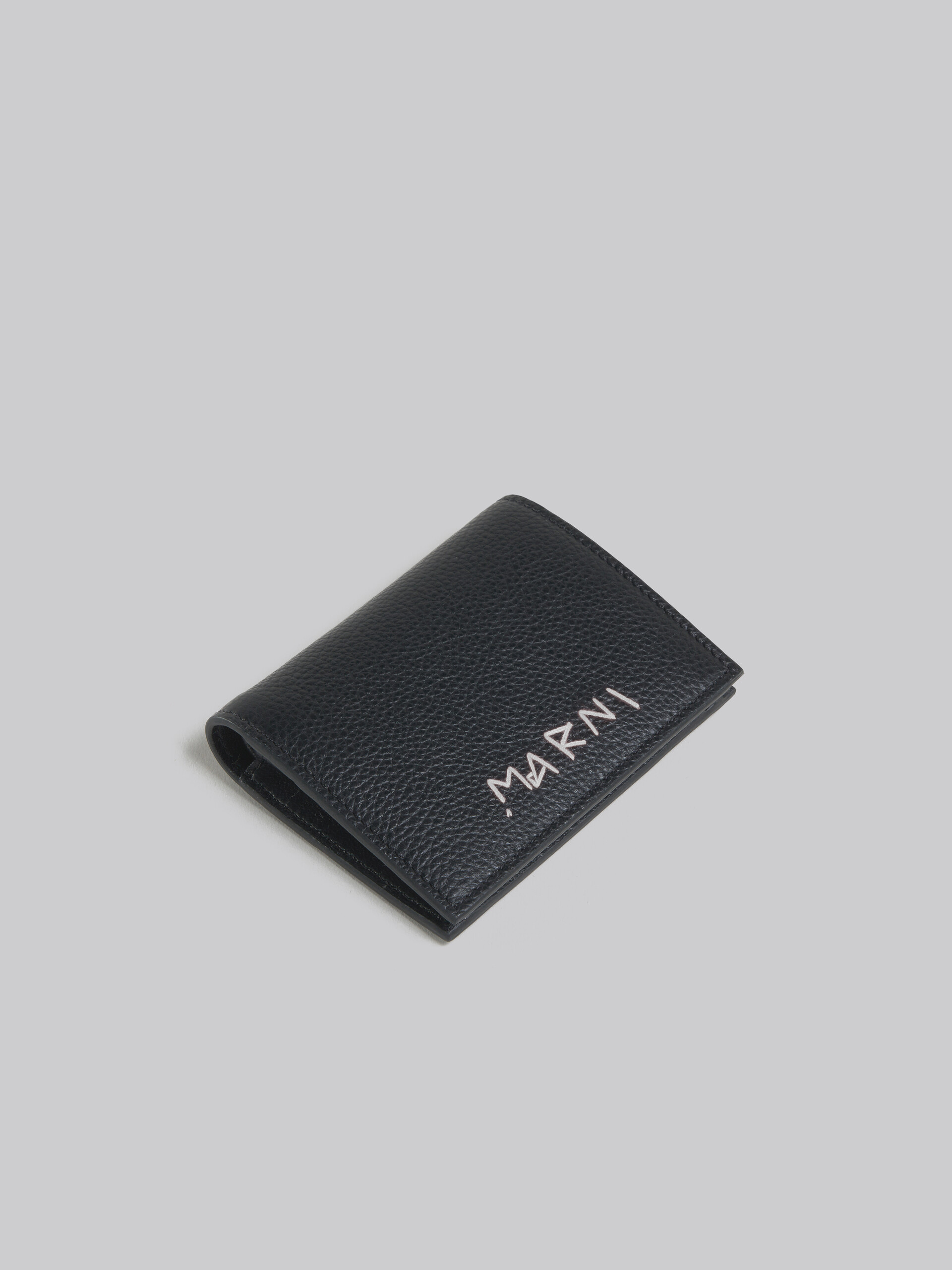 Black leather bifold wallet with Marni mending